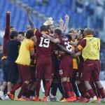 20150525_98770_De-Rossi-dito-medio-derby-Foto-a-pagamento